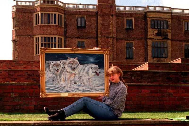 Garforth Art Club held their exhibition in the amphitheatre at Temple Newsam in May 1996. Pictured is Natalie Johansen with a painting by her father Roy.