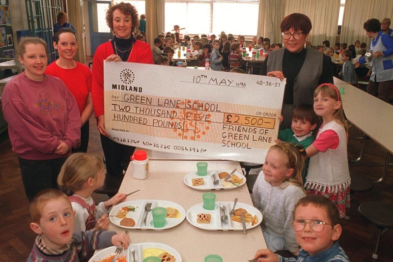 Friends of Green Lane Primary raised £2,500 for school funds. Parents Sharon Dixon, Julie Boothroyd, Pam Taylor present a cheque to headteacher Anita Davis and pupils Daniel Naylor and Alex Chandler.