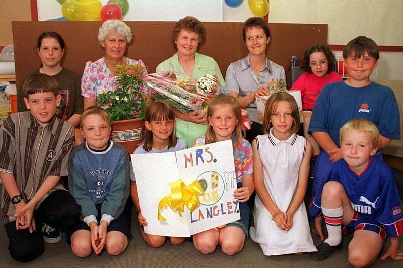 Dorothy Langley (with flowers) retired from the kitchens at West Garforth Junior School after 20 years.