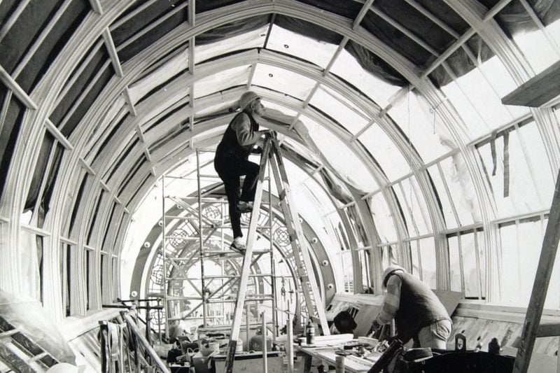 Joiners Sam Roomes (left) and Jim Pembleton replace rotten wood in the roof of Thornton's Arcade in October 1990. The arcade was being carefully repaired and restored.