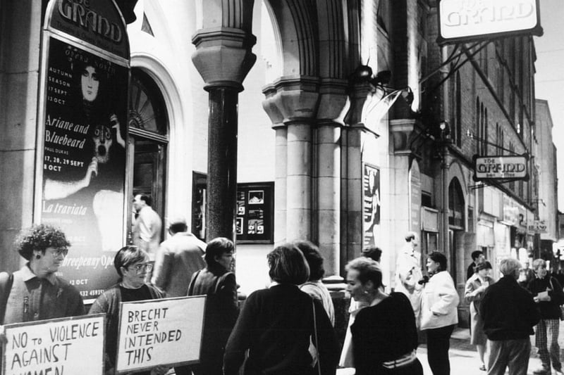 October 1990 and banner-waving protesters urged opera lovers to show their disapproval of controversial scenes featured in Opera North's The Threepenny Opera being staged at the Grand Theatre.