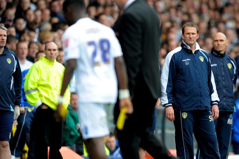 Leeds United manager Simon Grayson looks on as Max Gradel leaves the pitch after being sent off.