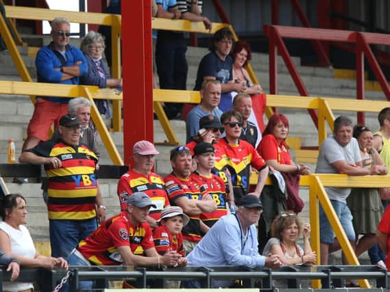 WATCHING ON: Supporters in the stands at the Tetley's Stadium. Picture: Thomas Fynn.
