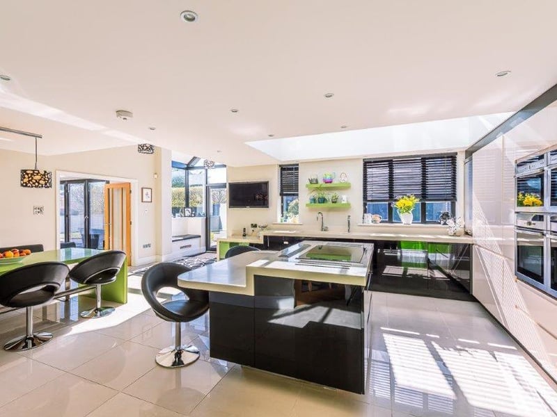 The sleek and shiny kitchen with integral appliances