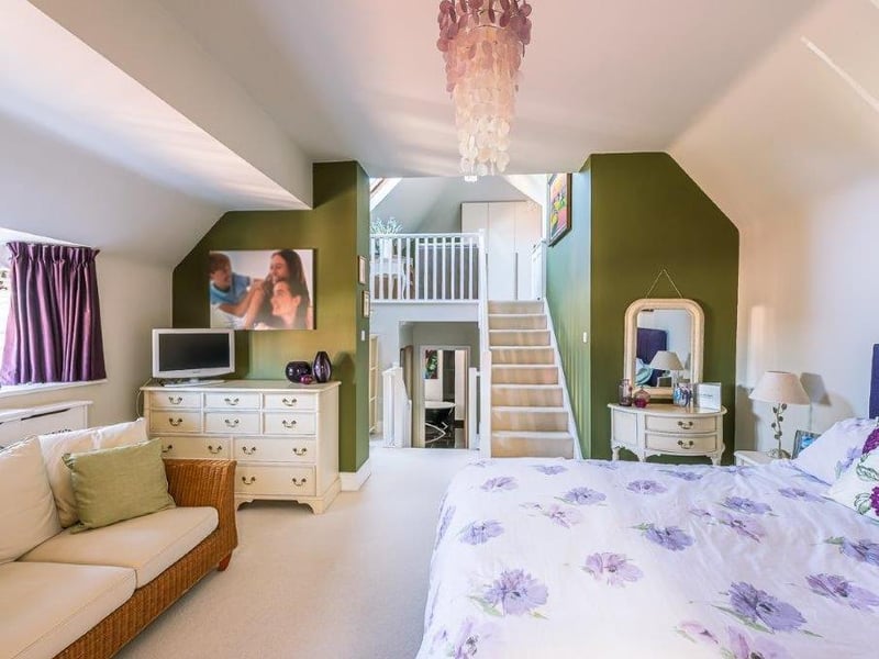 Pale decor adds to the spaciousness of the bedrooms