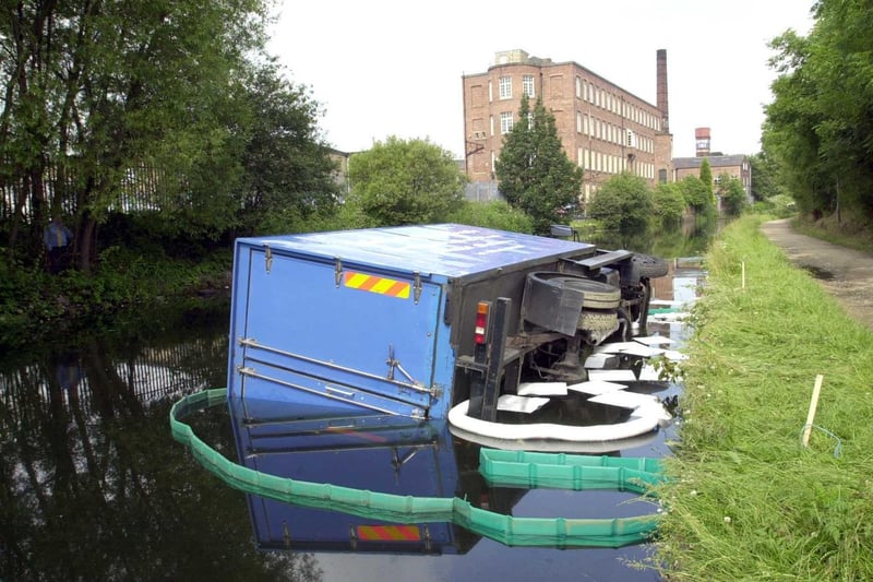 It proved to be a bad day at the office for this driver after his lorry ended up in its side in the Leeds Liverpool Canal.