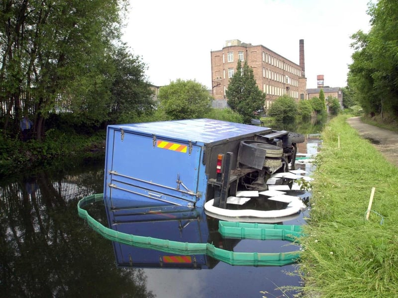 It proved to be a bad day at the office for this driver after his lorry ended up in its side in the Leeds Liverpool Canal.