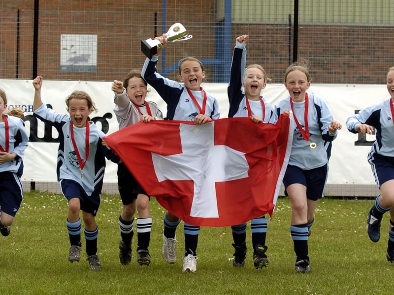 The winners celebrate
