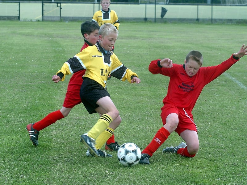 A sliding challenge in the boys event.