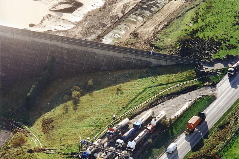 A fleet of water tankers taking water directly from the reservoir during a drought in 1995.
