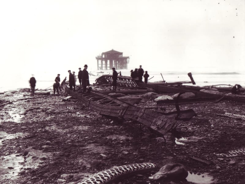 People survey the wreckage after the storm.