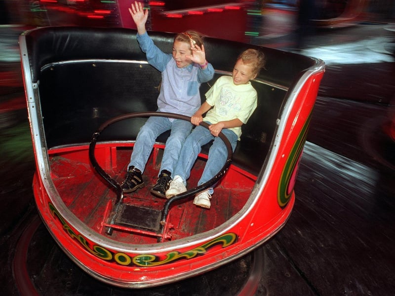 Best friends Lauren Grestly and Carley Vine enjoy the funfair attractions in June 1996.