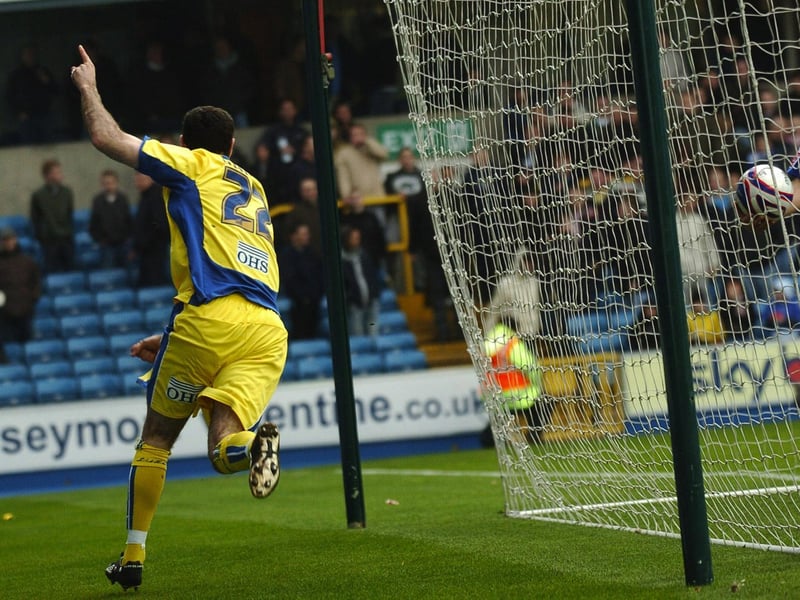 Andy Hughes celebrates after scoring against Millwall at The Den in April 2007. It proved to be his only goal for the Whites.