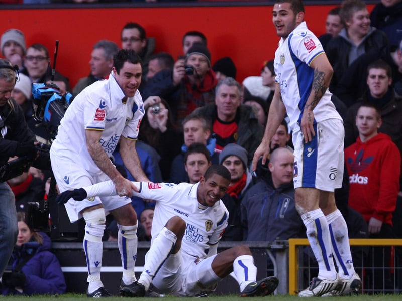 Andy Hughes helps Jermine Beckford get back up in his feet during the FA Cup third round clash against Mancester United at Old Trafford in January 2010.
