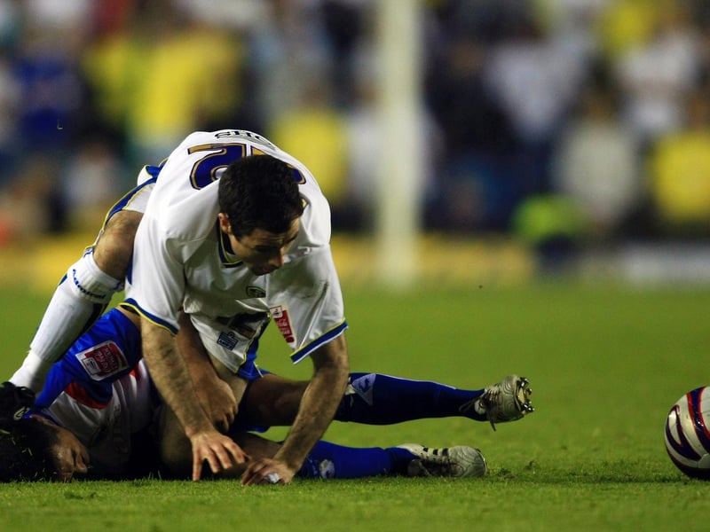 Andy Hughes gets in a tangle with Carlisle United's Evan Horwood during the League 1 play-off semi-final first leg at Elland Road in May 2008.