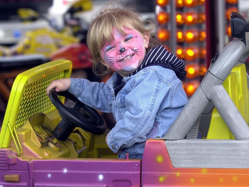 Ria Wale enjoys the fair at Horsforth Gala in June 2002.
