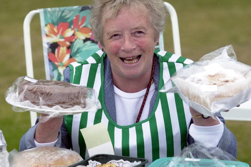 Barbara Reid, president of the Horsforth Women's Institute with home made cakes in June 2002.