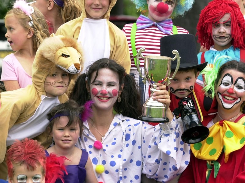 Parent Lydia Holder with the trophy for the best float won by West End Primary and Nursery School in June 2003.