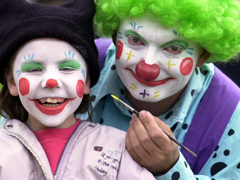 Bobbles the clown is pictured with Chloe Haley in June 2002.