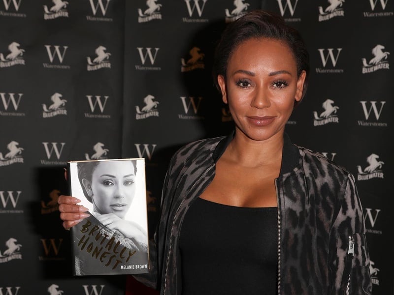 Melanie Brown with her best-selling book "Brutaly Honest"