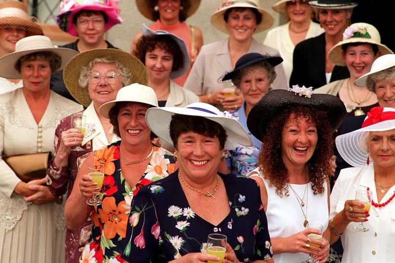 Landlady Beryl Flowers (centre) with some of the ladies who attended Ascot Ladies Day at the Spangle Bull pub in Earlsheaton.
