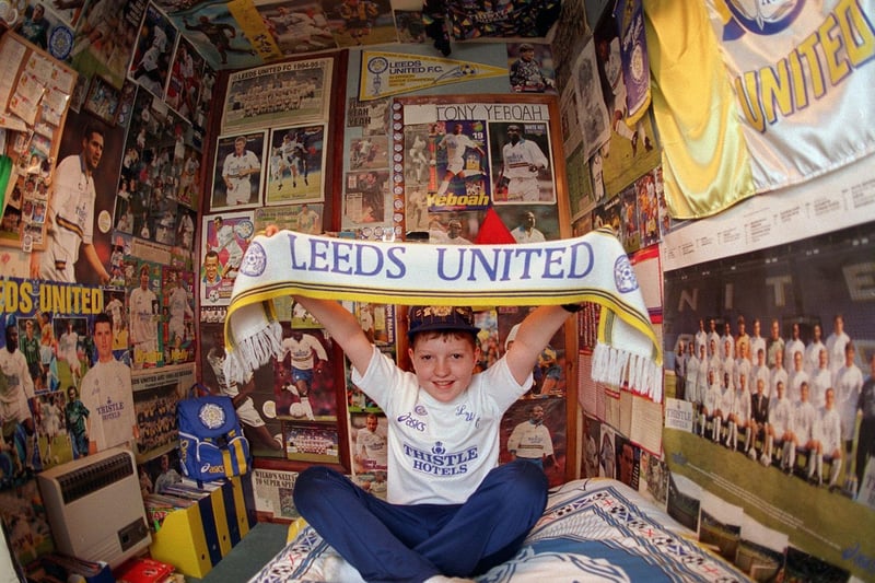 Andrew Wadsworth in his bedroom in Dewsbury, a 'shrine' to his favourite team, Leeds United.