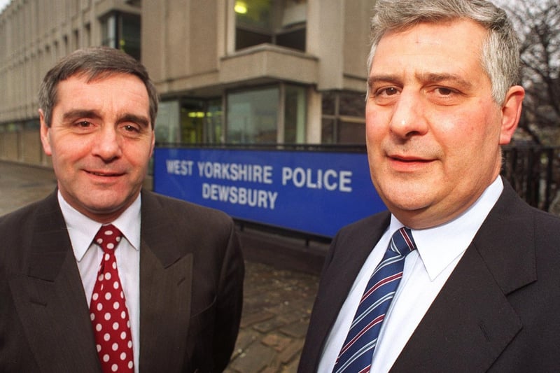 Inspector John Mason, (left) head of Community Involvement Unit for Dewsbury Division, hands over to new chief Sgt Dave Fox at the Dewsbury Police Station in January 1996.