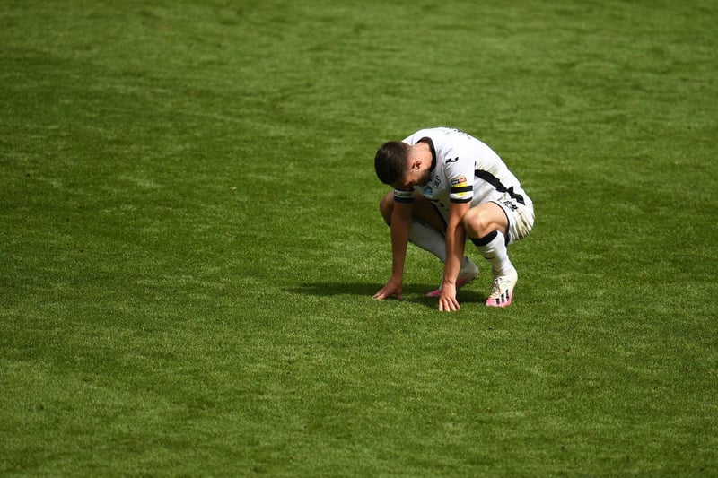 Swansea City captain and former Whites midfielder Matt Grimes is left devastated at full-time.