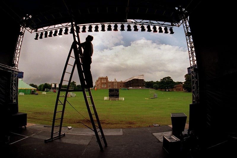 Dave Whitlestone checks the lighting on the main stage at Temple Newsam Park.