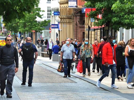 Shoppers on Fishergate in Preston city centre.