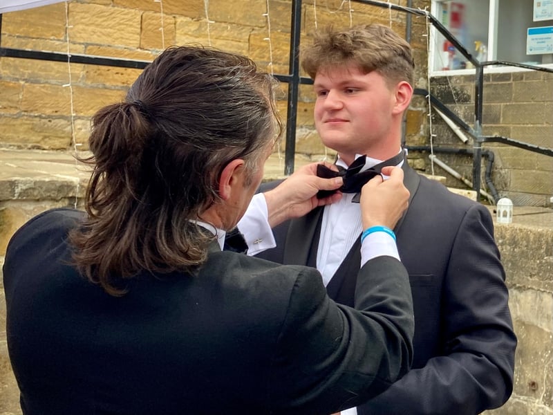 Getting the bow tie straightened!