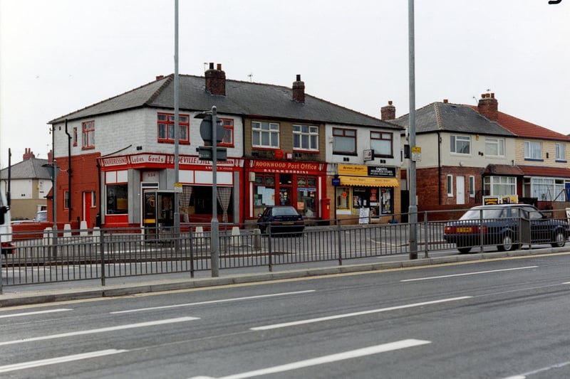 York Road in March 1991 featuring Neville & Jill's Ladies and gents hairdressing, Rookwood Post Office and Sanghera Rookwood Stores, off licence, newsagent and videos.