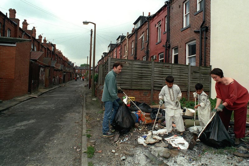 Members of Harehills Matters Richard Gale and Karen Harris clean up Back Sandhurst Road with the help of local children in June 1999.