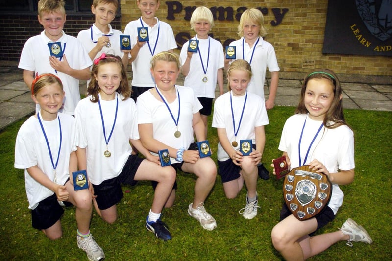 The Wheatcroft team winners of the Scarborough Schools Athletics Tournament are pictured with their medals and trophies.