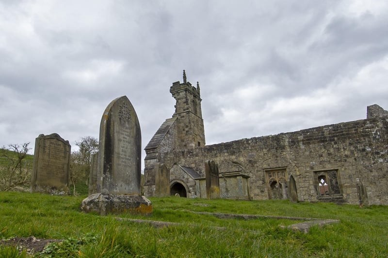The graveyard by the ruins of St Martin's Church at the deserted medieval village of Wharram Percy
