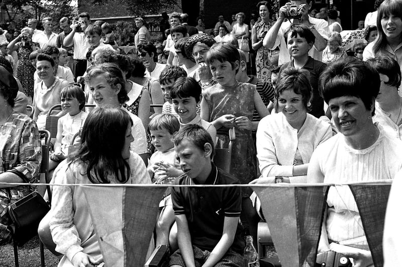 Retro 1969 - The crowd at the Rose Queen crowning ceremony at St John's Church garden party Hindley Green.