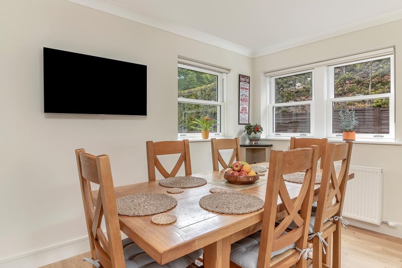 To the back of the kitchen is a less formal dining area.