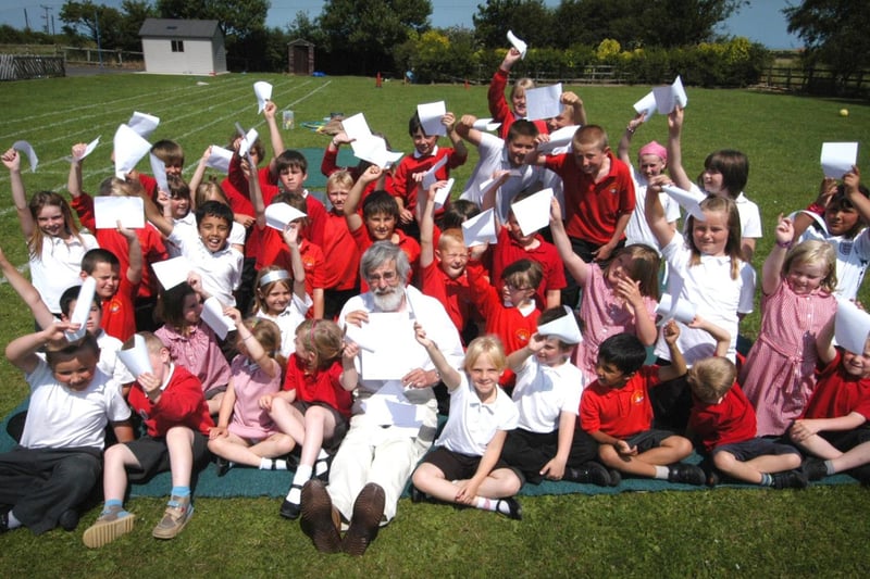 John Barber, head teacher of Hawsker Primary School, celebrates the school’s good Ofsted report with his pupils.