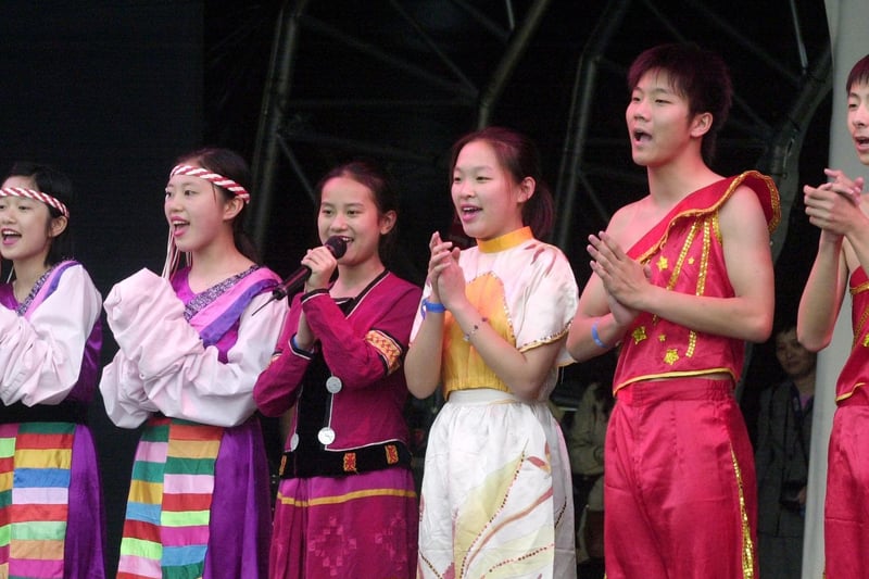 No.4 middle school, Hangzhou in China performs extracts from Crouching Tiger Hidden Dragon on stage in Millennium Square as part of the Breeze Festival.