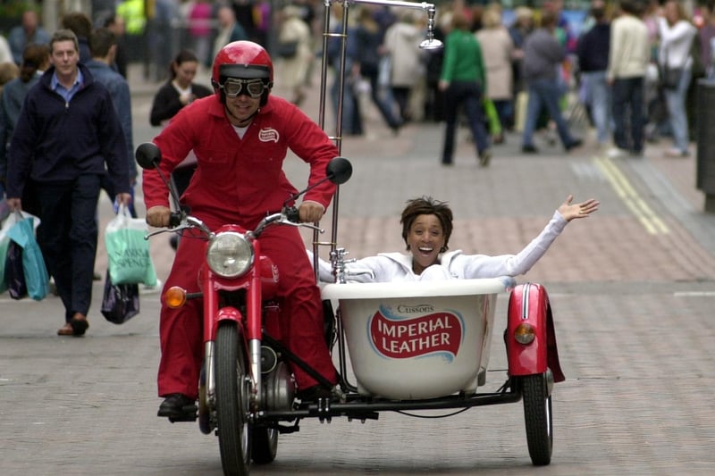 Imperial Leather promotion in Leeds with Commonwealth athlete Diane Modahl. She is pictured with Richie Eley on the motorcycle and bath in Briggate.
