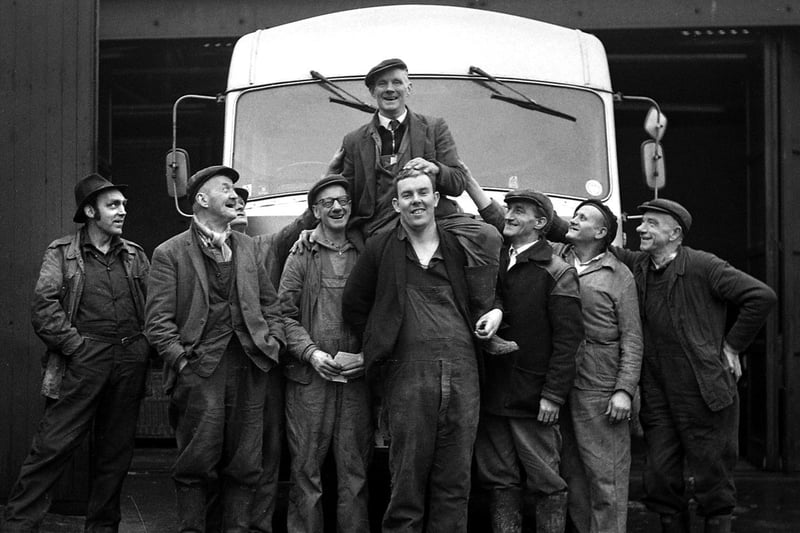 Standish dustman Tommy Jones is held aloft by his fellow workers in 1970 at his retirement