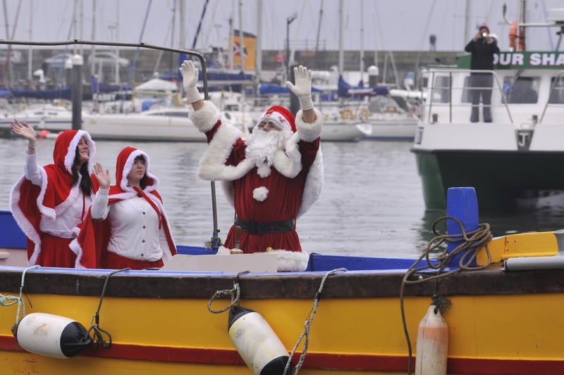 Watched Santa arrive into the harbour by boat and followed the procession up to Boyes.