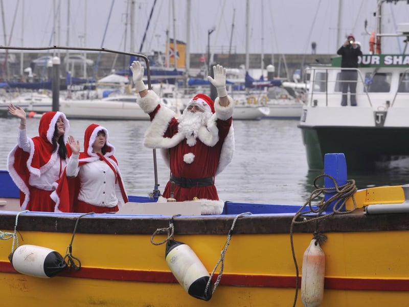 Watched Santa arrive into the harbour by boat and followed the procession up to Boyes.