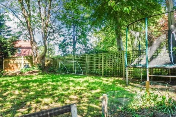 There is also plenty of green space for children to enjoy, with the current owners currently having a large trampoline.