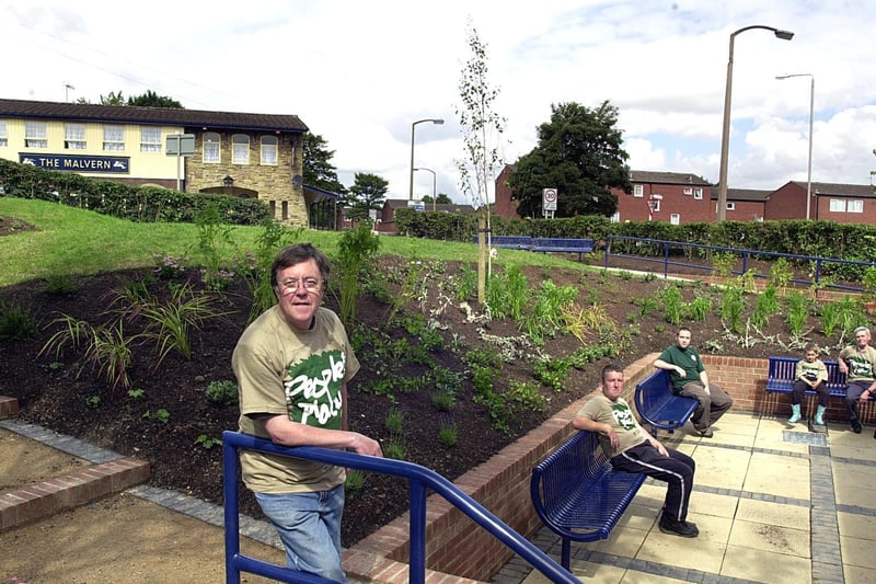Church minister Rev Tony Lee (front) pictured at the new Malvern Road Community Garden in the grounds of Beeston Hill United Free Church.