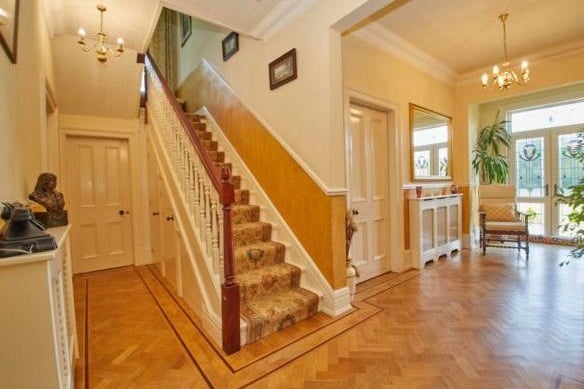 Enter into the beautiful, warm and spacious hallway. The cosy space benefits from glass doors into the garden, the main staircase and has enough room to sit and relax. There is also a handy W.C in this area.