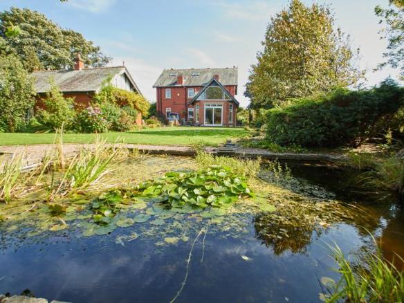 The stunningly landscaped gardens offer a tranquil place to relax.