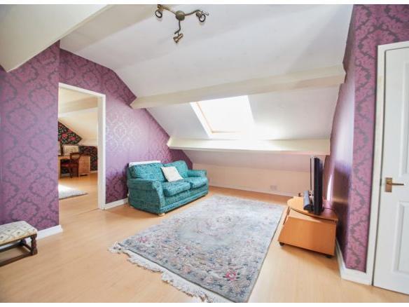 The second floor comprises of a self-contained suite with a bedroom, sitting room and bathroom.