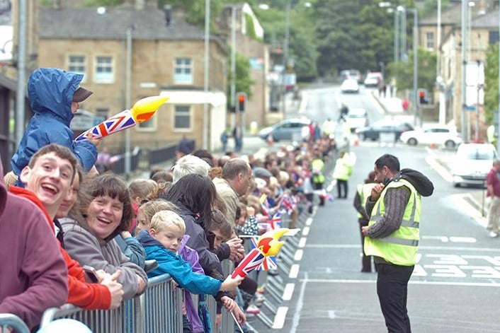 Crowds gathered in Burnley to see the torch pass through the town.