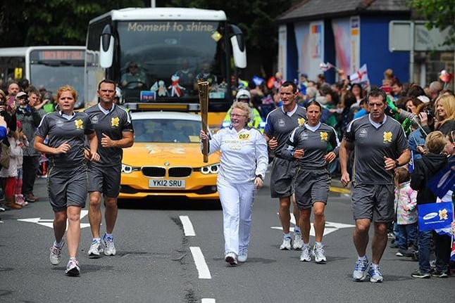 Torchbearer 087 Barbara Horne carried the Olympic Flame on the Torch Relay leg between Burnley and Rawtenstall.